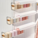 Wall-mounted laundry organizer with compartments, retractable