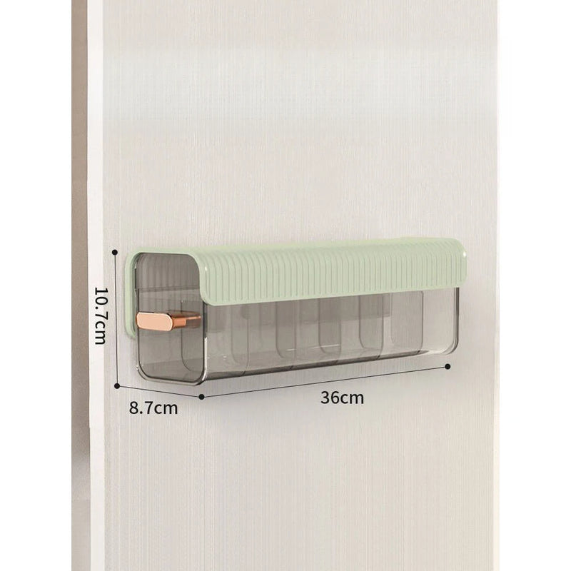 Wall-mounted laundry organizer with compartments, retractable