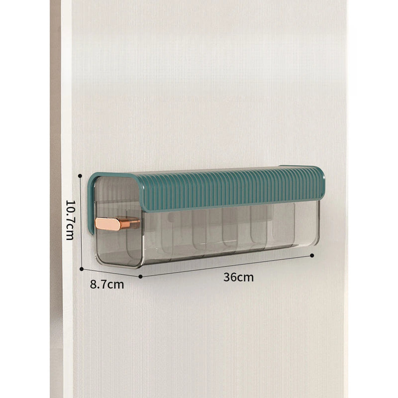 Wall-mounted laundry organizer with compartments, retractable