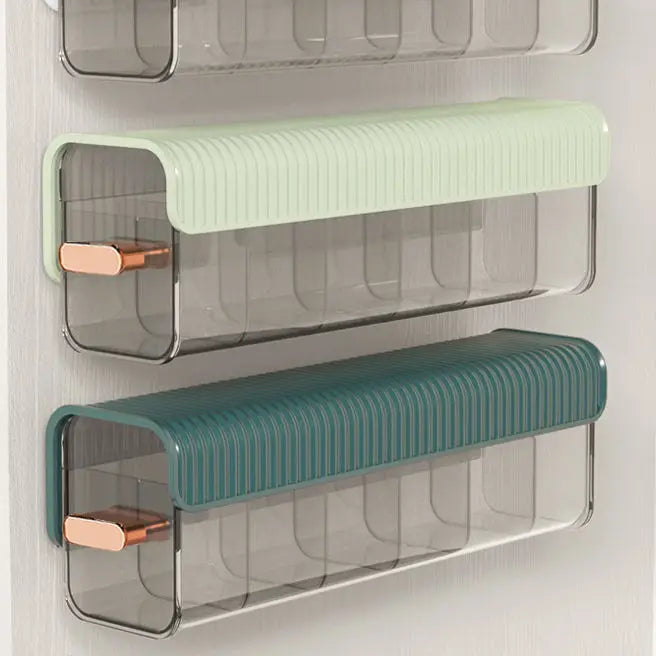 Wall-mounted laundry organizer with compartments, retractable