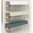 Wall-mounted laundry organizer with compartments, retractable